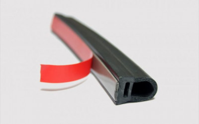 Sealing gasket with adhesive tape