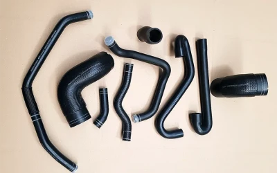 Cooling rubber hoses with textile insert